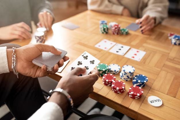 kapten5000 Capsa Susun live table interface showing card arrangement UI and player positions