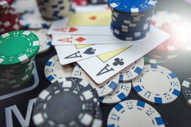 Live casino dealer at roulette table with multi-camera angle view